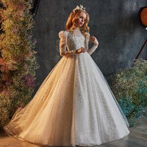 Starlight glitter tulle dress with long sleeves. Lush communion dress